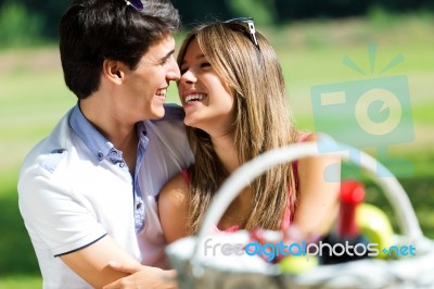 Attractive Couple On Romantic Picnic In Countryside Stock Photo