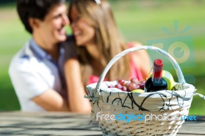 Attractive Couple On Romantic Picnic In Countryside Stock Photo