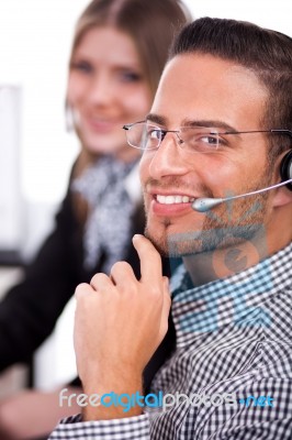 Attractive Executive Smiling With A Collegue Stock Photo