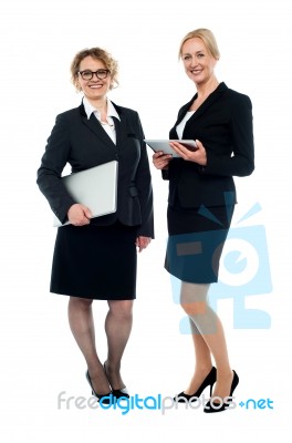 Attractive Female Executives, Full Length Shot Stock Photo