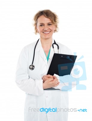 Attractive Female Physician In Uniform Stock Photo