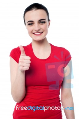 Attractive Girl Showing Thumbs Up Stock Photo