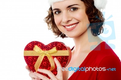 Attractive Santa Showing Gift Box Stock Photo