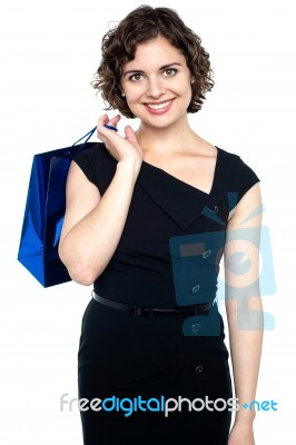 Attractive Shopaholic Woman Carrying Shopping Bag Stock Photo