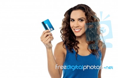 Attractive Woman Displaying Her Credit Card Stock Photo