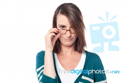 Attractive Woman Holding Her Eyeglasses Stock Photo