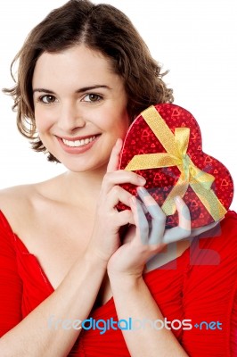 Attractive Woman Holding Valentine Gift Stock Photo