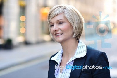 Attractive Woman In City Centre Location Stock Photo