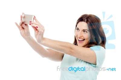 Attractive Woman Is Taking Photos With Cell Phone Stock Photo