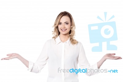 Attractive Woman Presenting Something Stock Photo