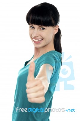 Attractive Woman Showing Thumbs Up Gesture Stock Photo