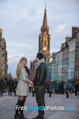 Attractive Young Couple On Royal Mile, Edinburgh Stock Photo