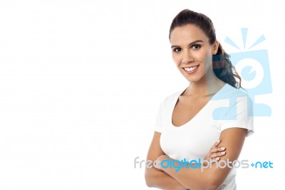 Attractive Young Woman, Arms Folded Stock Photo