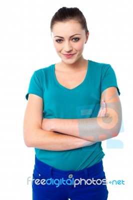 Attractive Young Woman With Folded Arms Stock Photo