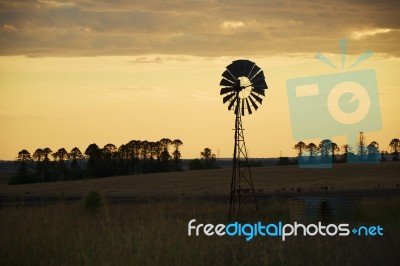 Australian Windmill In The Countryside Stock Photo