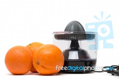 Automatic Orange Juicer Machine Stock Photo