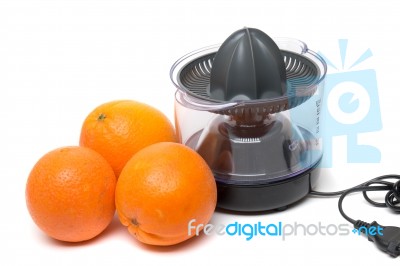 Automatic Orange Juicer Machine Stock Photo