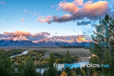 Autumn Sunrise Over The Grand Tetons Stock Photo