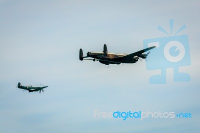 Avro Lancaster And Spitfire Mk1 At Airbourne Stock Photo