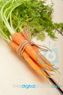 Baby Carrots Bunch Tied With Rope Stock Photo