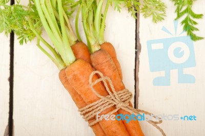 Baby Carrots Bunch Tied With Rope Stock Photo