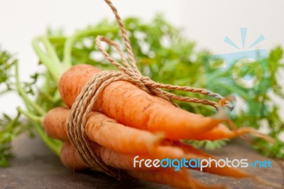 Baby Carrots Bunch Tied With Rope Stock Photo