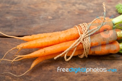 Baby Carrots Bunch Tied With Rope Stock Photo