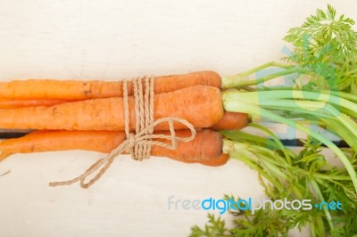 Baby Carrots Bunch Tied With Rope Stock Photo