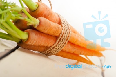 Baby Carrots Bunch Tied With Rope Stock Photo