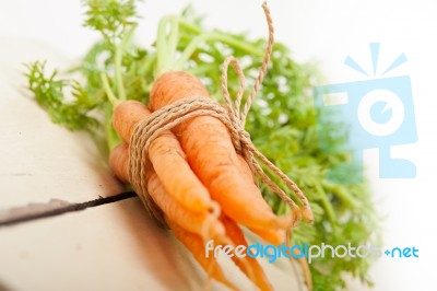 Baby Carrots Bunch Tied With Rope Stock Photo