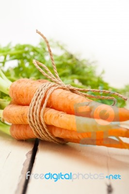 Baby Carrots Bunch Tied With Rope Stock Photo