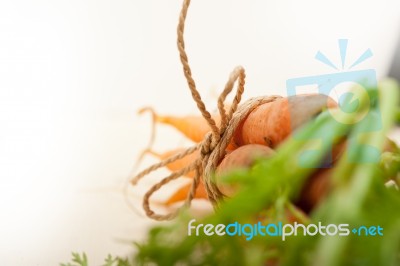 Baby Carrots Bunch Tied With Rope Stock Photo