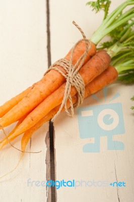 Baby Carrots Bunch Tied With Rope Stock Photo