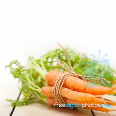 Baby Carrots Bunch Tied With Rope Stock Photo