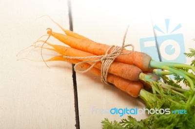 Baby Carrots Bunch Tied With Rope Stock Photo