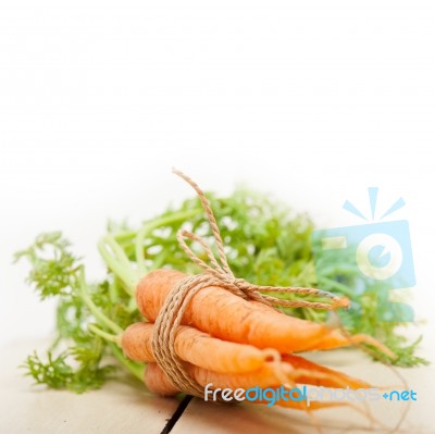 Baby Carrots Bunch Tied With Rope Stock Photo