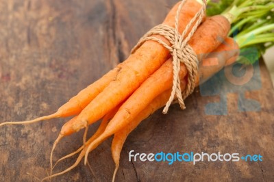 Baby Carrots Bunch Tied With Rope Stock Photo