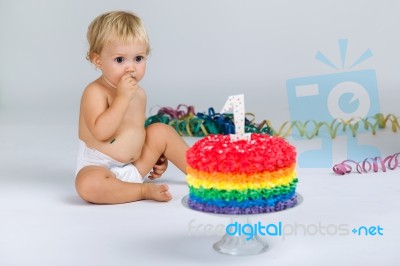 Baby Girl Celebrating Her First Bithday With Gourmet Cake And Ba… Stock Photo