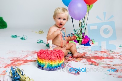 Baby Girl Celebrating Her First Bithday With Gourmet Cake And Ba… Stock Photo