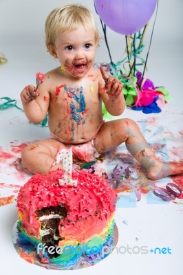 Baby Girl Celebrating Her First Bithday With Gourmet Cake And Ba… Stock Photo