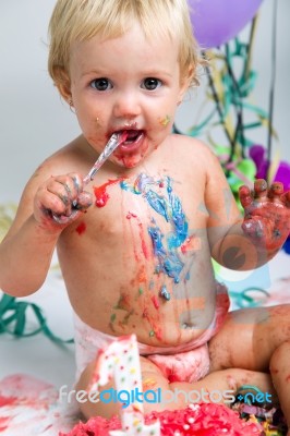 Baby Girl Celebrating Her First Bithday With Gourmet Cake And Ba… Stock Photo