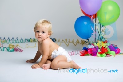 Baby Girl Celebrating Her First Bithday With Gourmet Cake And Ba… Stock Photo