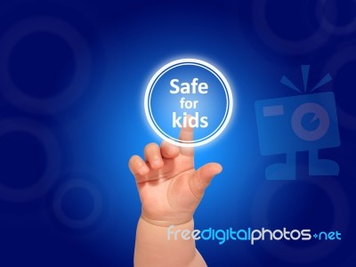 Baby Hand Pressing Button Stock Photo