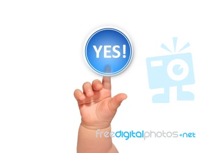 Baby Hand Pressing Button Stock Photo