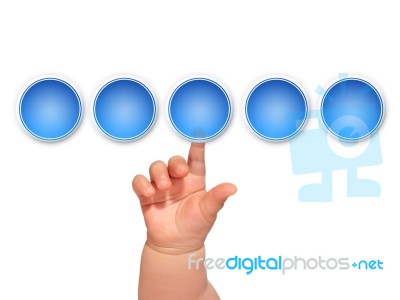 Baby Hand Pressing Button Stock Photo