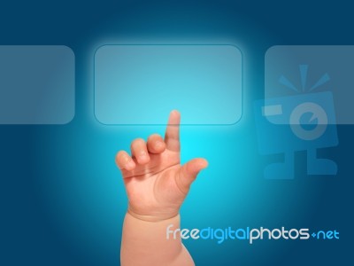 Baby Hand Pressing Button Stock Photo