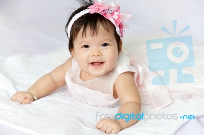 Baby Is Smiling And Happy Stock Photo