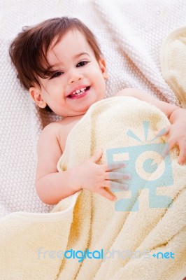 Baby Lying Down After Bath Stock Photo