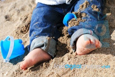 Baby On The Beach Stock Photo