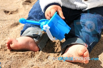 Baby On The Beach Stock Photo